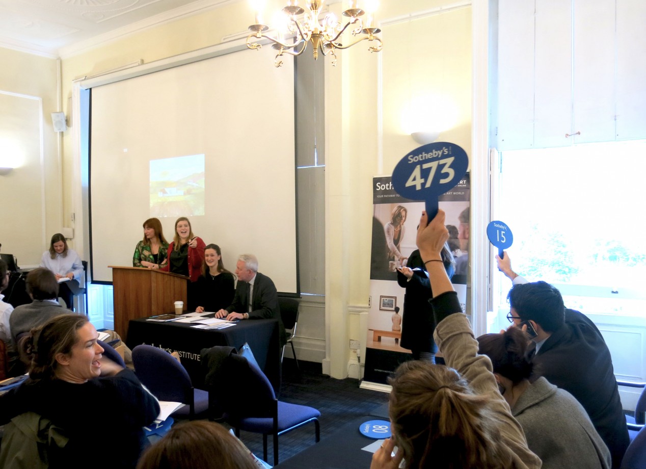 Art and Business students taking part in a mock auction with the help of Sotheby’s staff > 